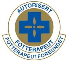 Autorisert fotterapeut logo med blått kors og gull bakgrunn i sirkelform med fransk tekst